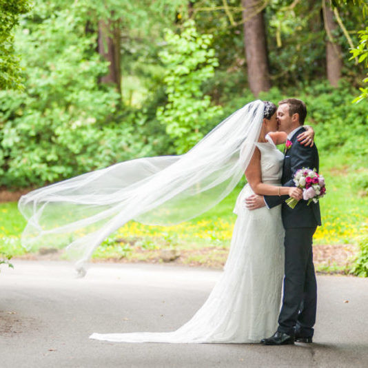 Brides veil blowing in wind, Sheffield wedding photographers, Whirlowbrook Hall