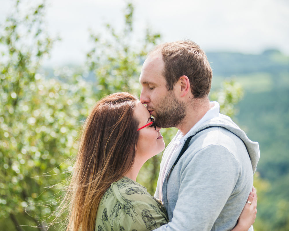 Max kissing Louisa on head - Sheffield wedding photographers