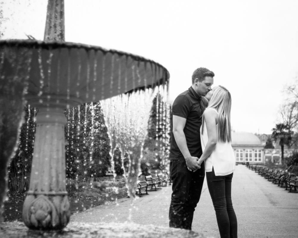 Kissing by the fountain, Botanical Gardens Sheffield wedding photographers