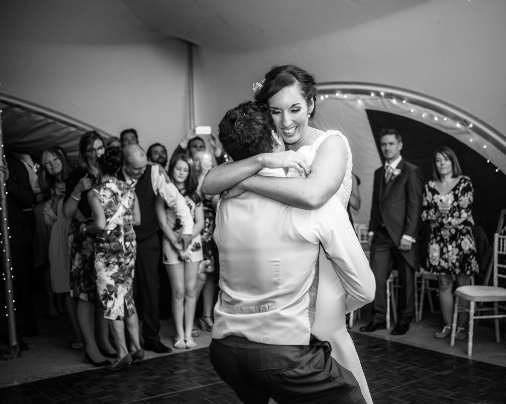 Lifting up bride, Sheffield wedding photographers