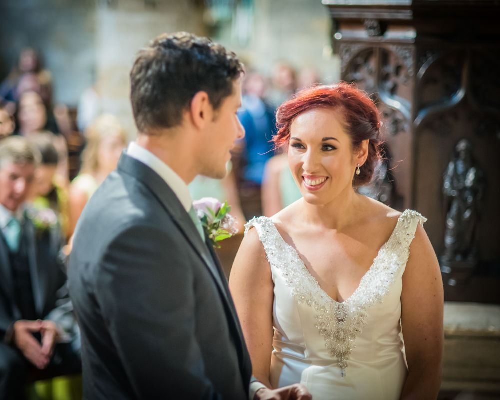 Exchanging, vows, Sheffield wedding photographers