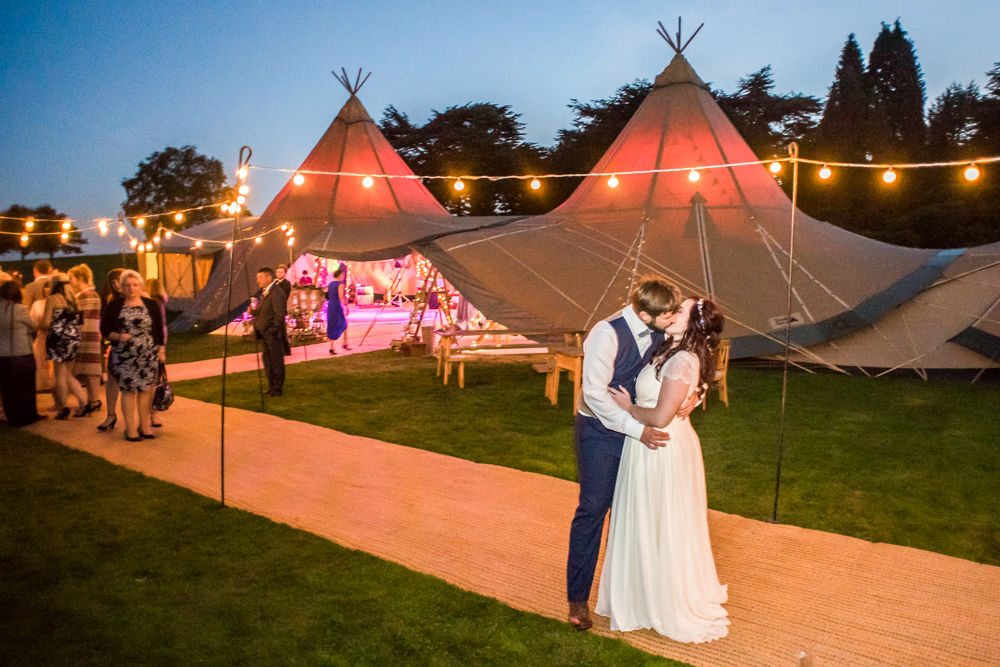 Kisses outside tipi,  Wentworth Castle Garden wedding, Sheffield photographers