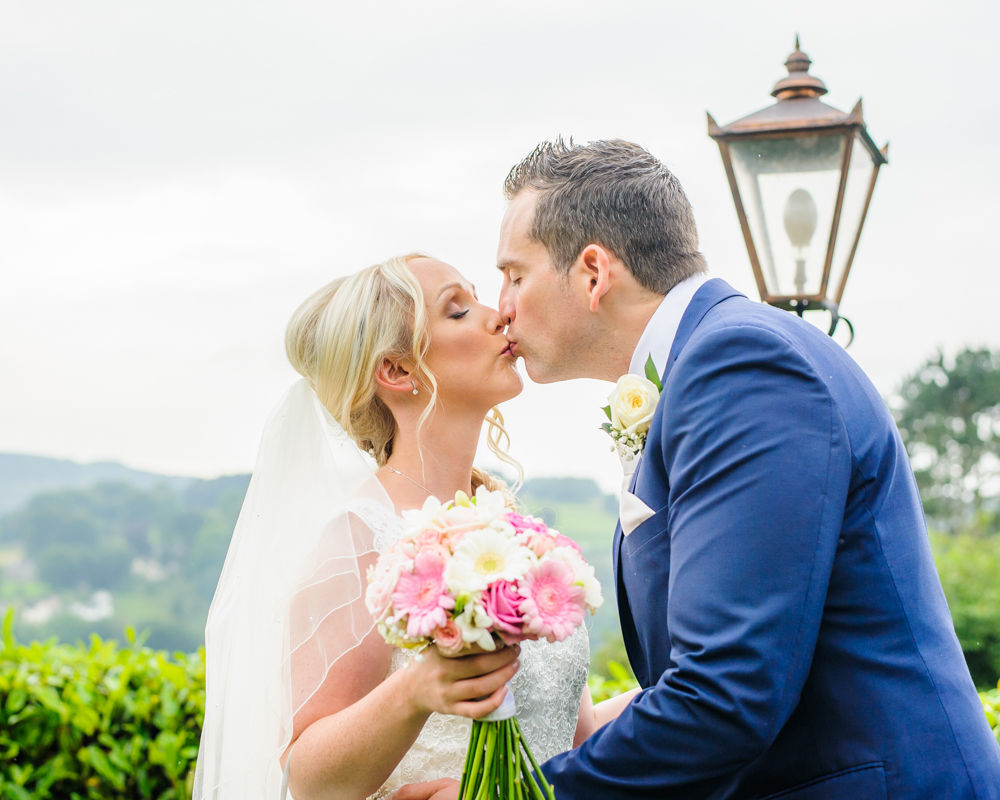 Kisses in grounds of Maynard, Maynard wedding photography Sheffield