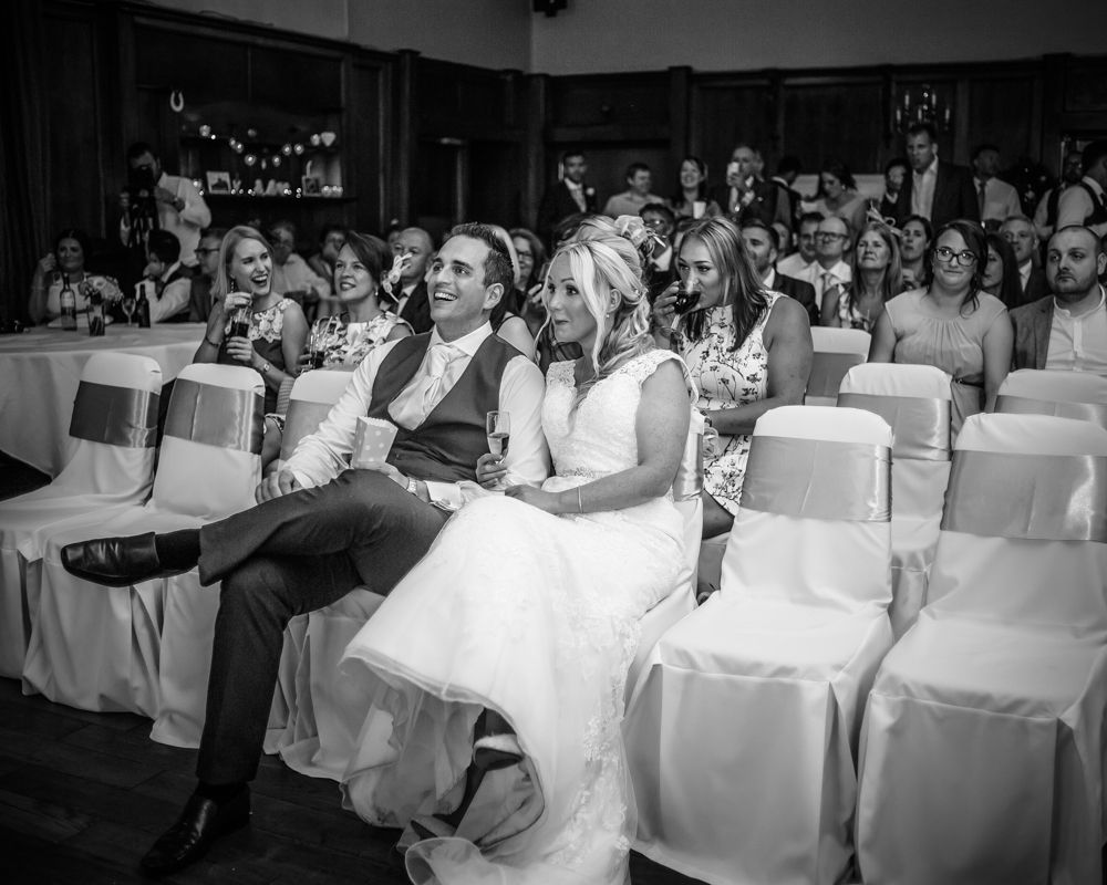 Watching a film on wedding day, Maynard wedding photography Sheffield