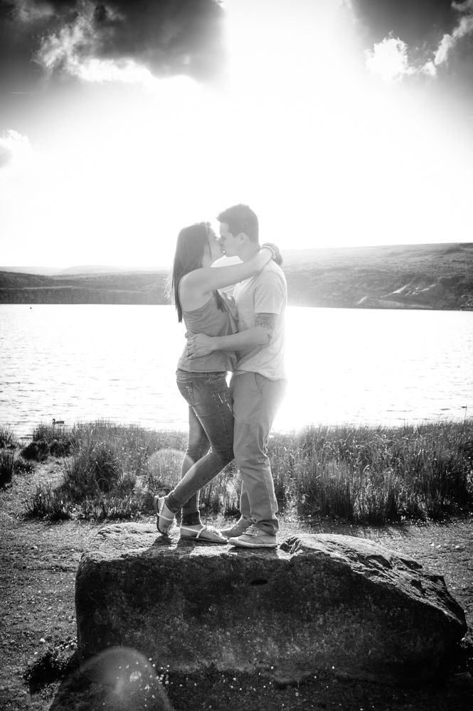 Kissing in front of reservoir, Sheffield weddings