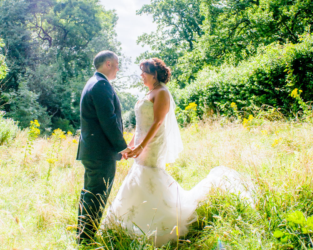 Outside in grounds, meadow, Whitley Hall weddings, Sheffield wedding photographers