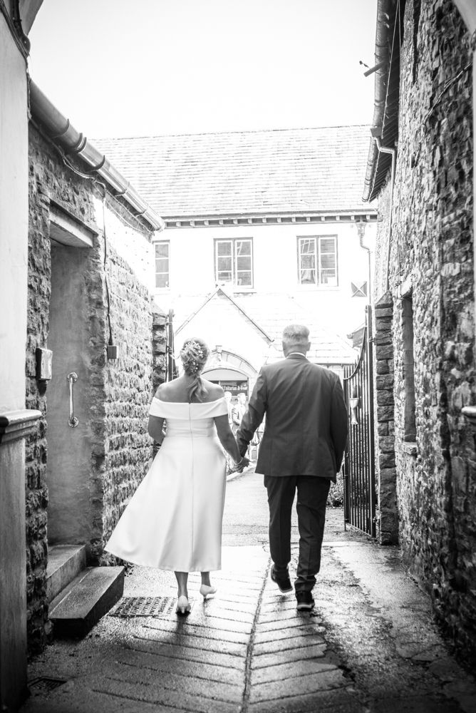 Walking into wedding, Cumbria wedding photographers