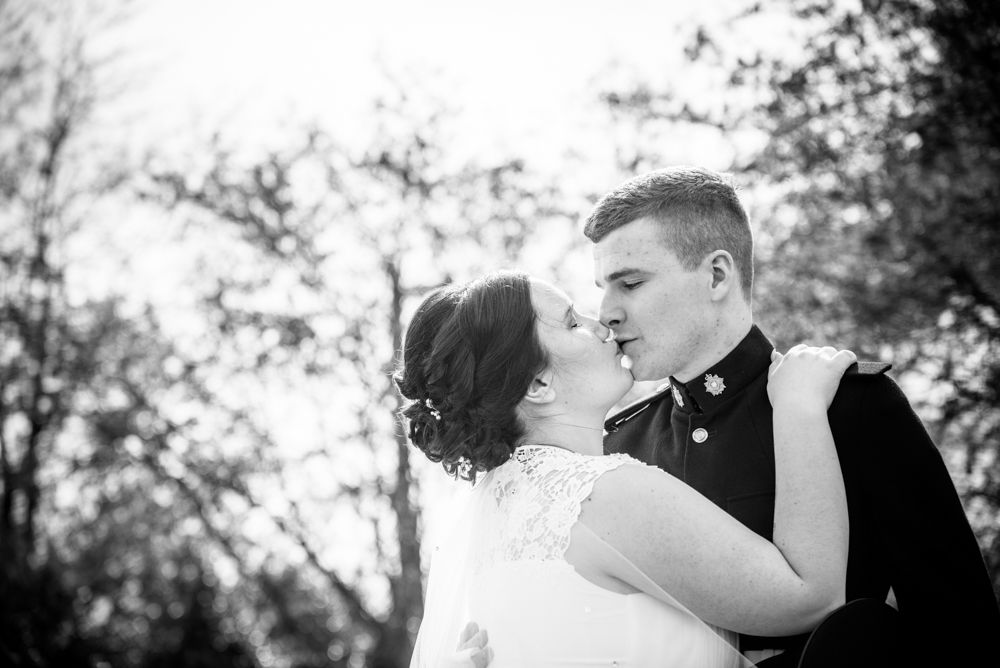 Kisses in water gardens, Greens at Gretna wedding photographer