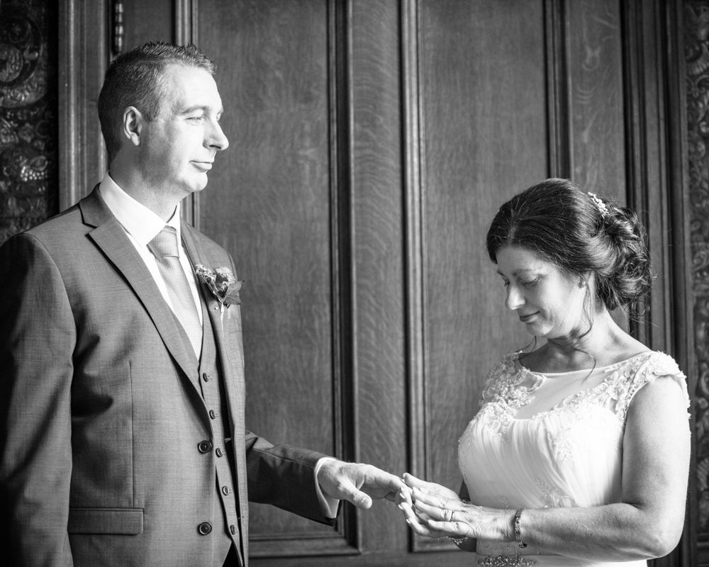 Gill putting ring on Monty, Lingholm wedding, Lake District