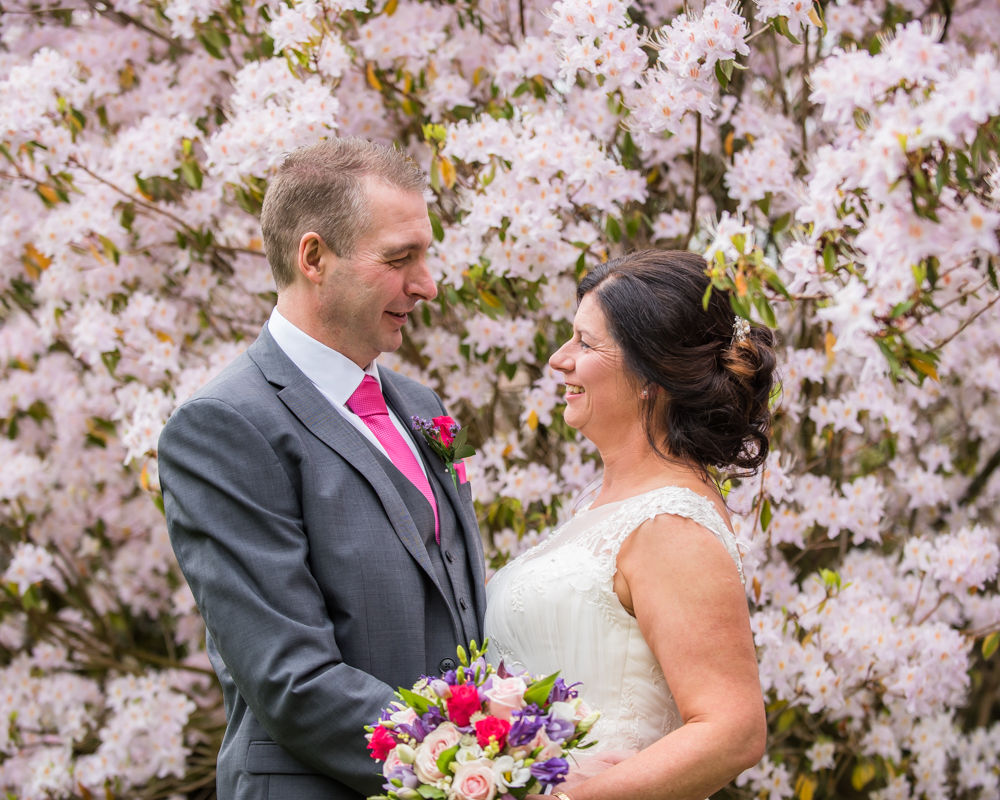 Smiles in the blossom, Lingholm wedding, Lake District
