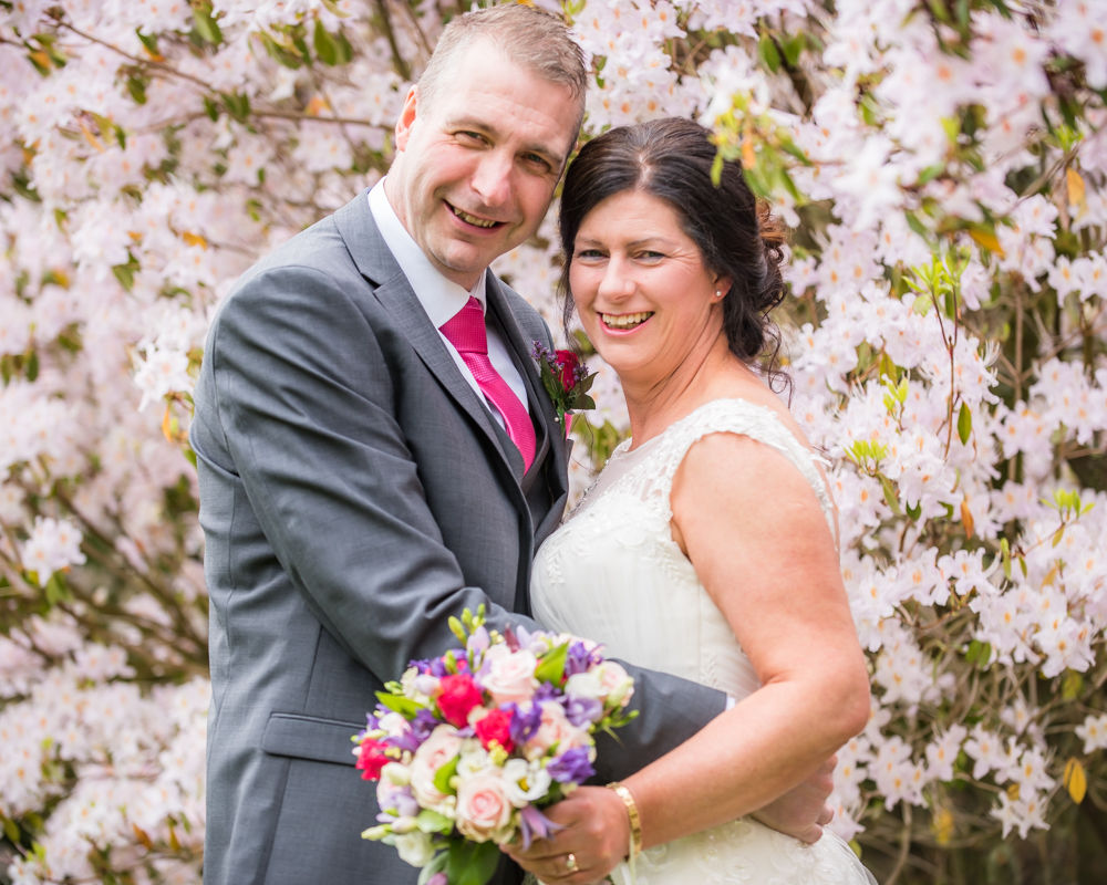 Laughing for camera, Lingholm wedding, Lake District