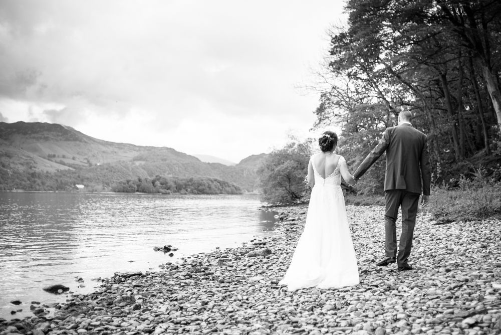 Walking along the shore, Lingholm wedding, Lake District
