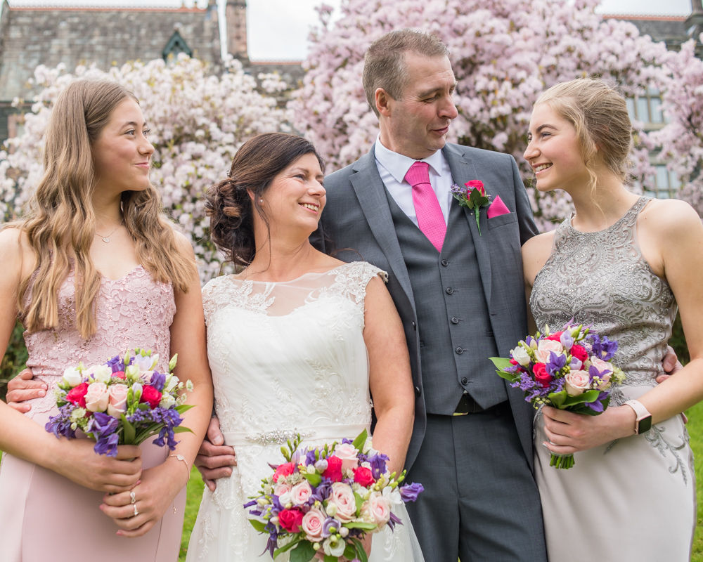 With their daughters laughing