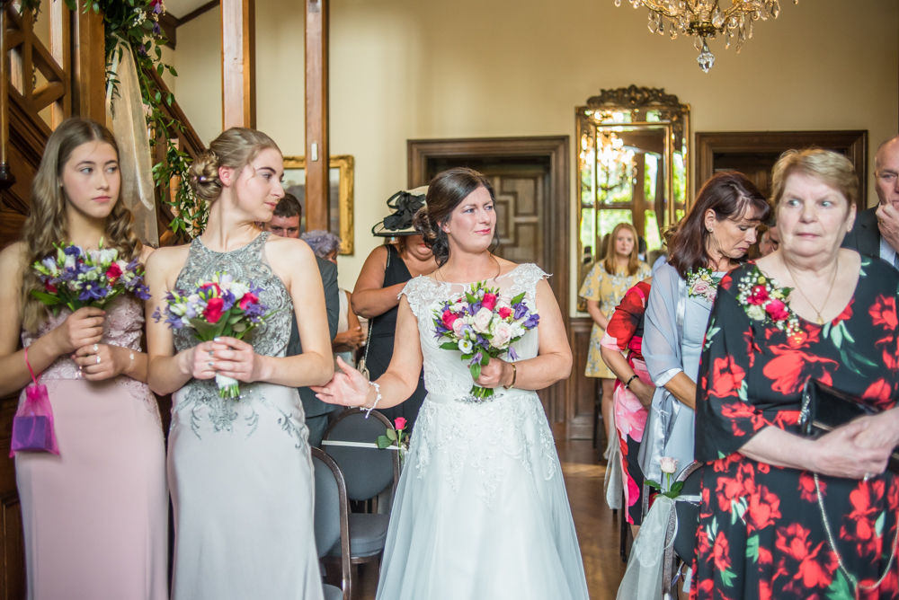 getting support from her daughter walking down aisle, Lingholm wedding, Lake District