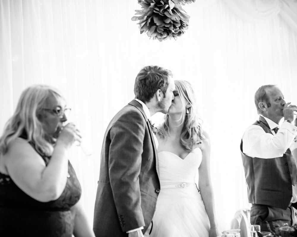 Kiss at end of speeches, Maynard wedding, Sheffield photographers