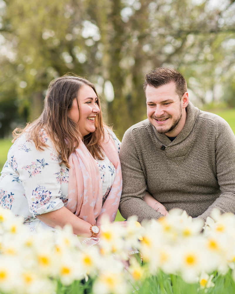 Alex & Ben laughing in daffodils, Sheffield wedding photographers