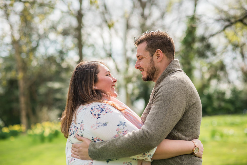 Smiles for each other, Sheffield Botanical Gardens engagement shoot
