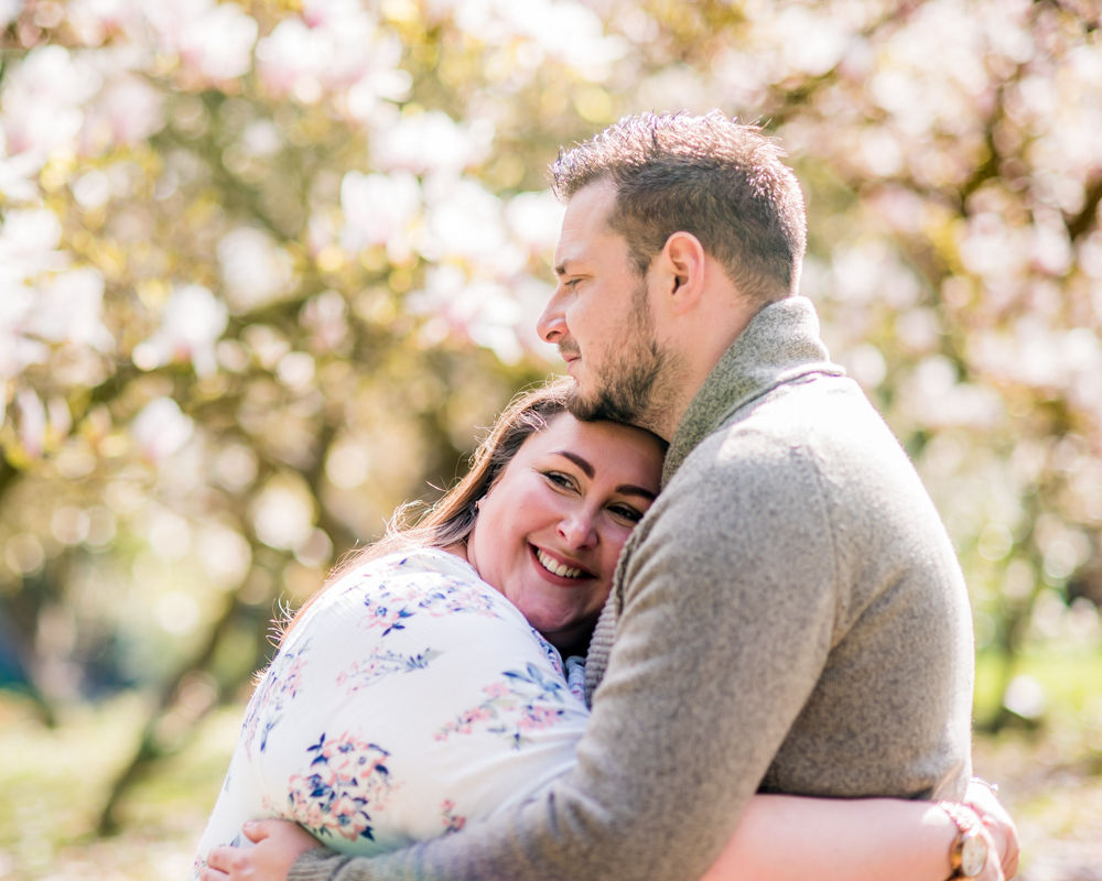 Cuddles in blossoms, Yorkshire wedding photographers