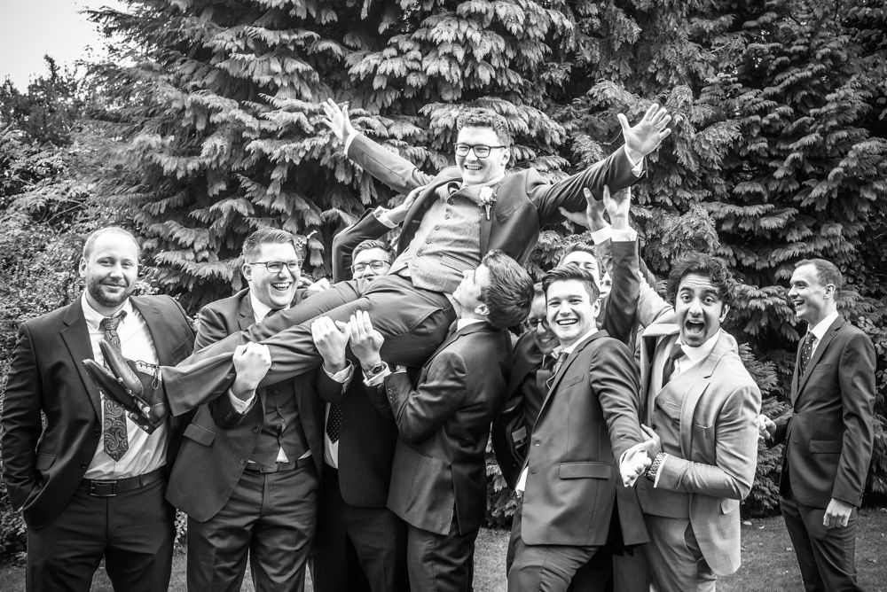 Groomsmen lifting groom photo at Halifax Hall, Sheffield 