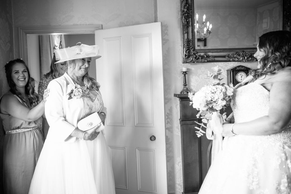 Bride's mum seeing her in dress, emotional