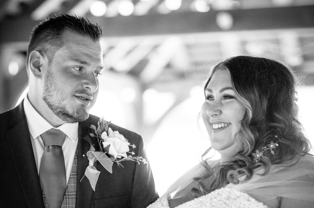 Bride and groom laughing in ceremony, Ye Olde Bell wedding, Retford