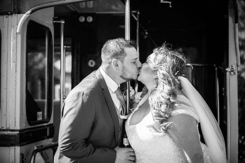 Kissing on vintage bus, Ye Olde Bell wedding, Retford