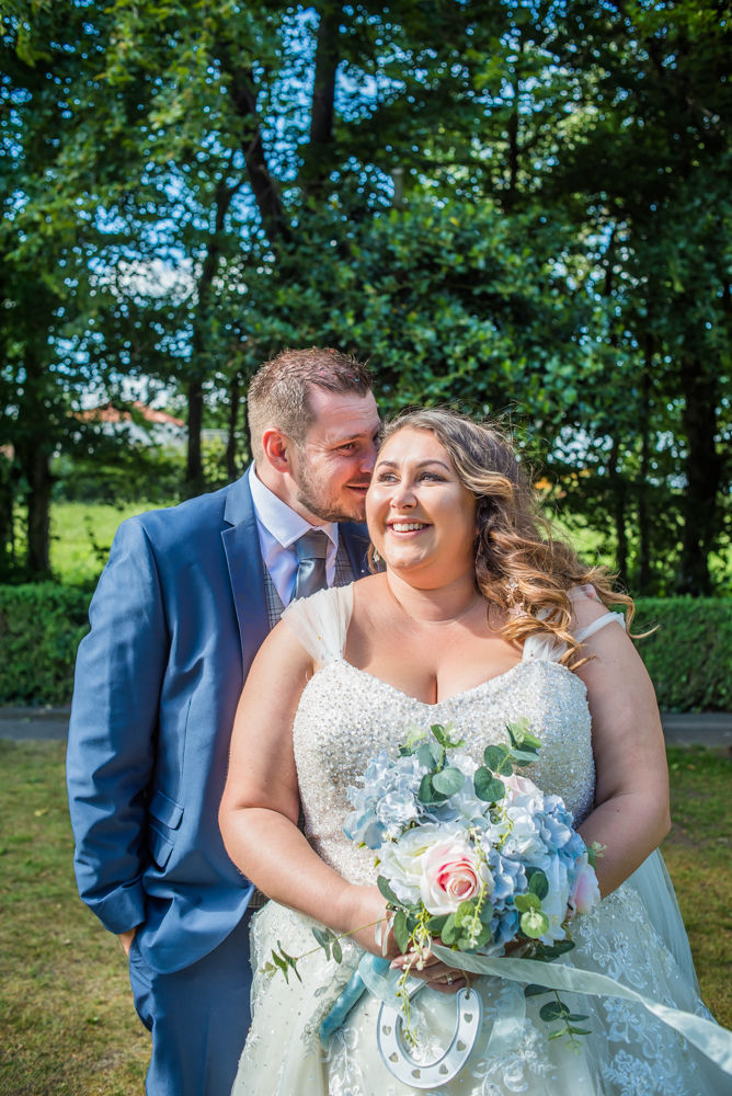 Ben whispering in Alex's ear, Ye Olde Bell wedding, Retford