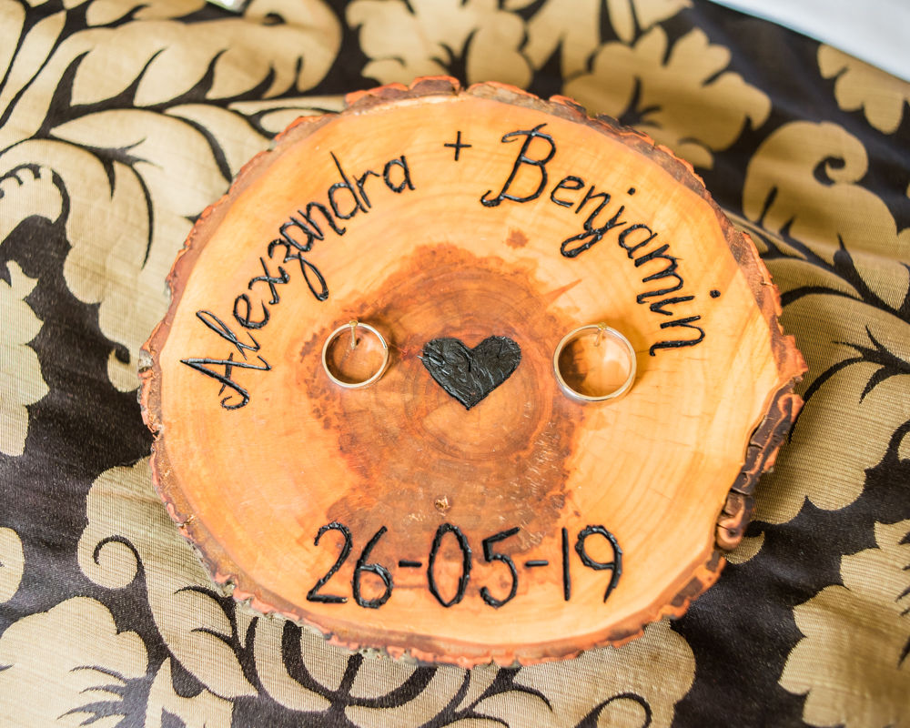 Rings on wood platter, Sheffield weddings