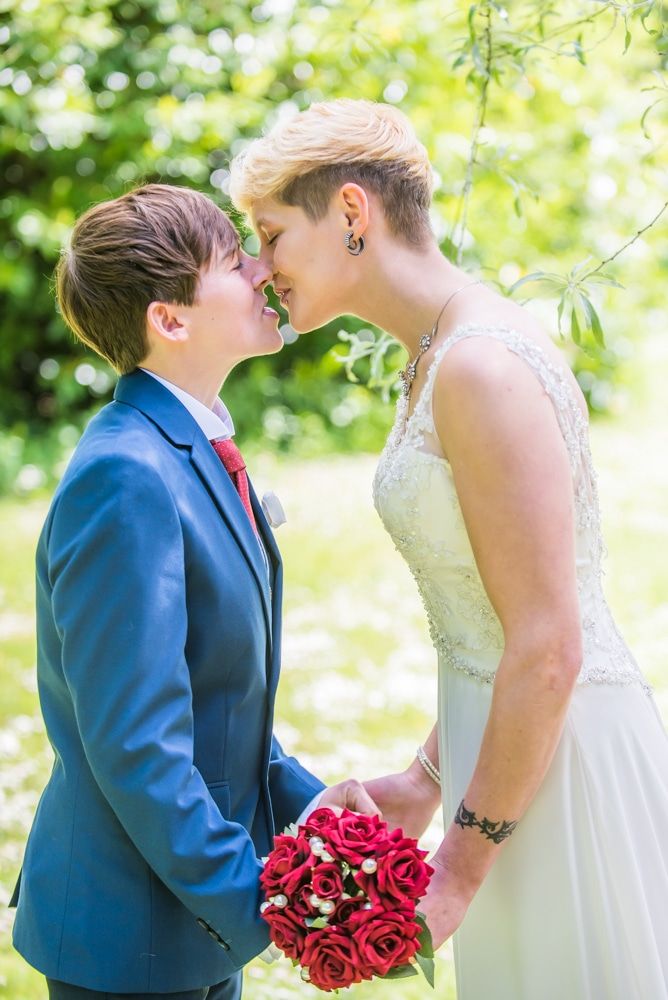 Shirley and Kate kiss, Carlisle Register office, Lake District wedding photography