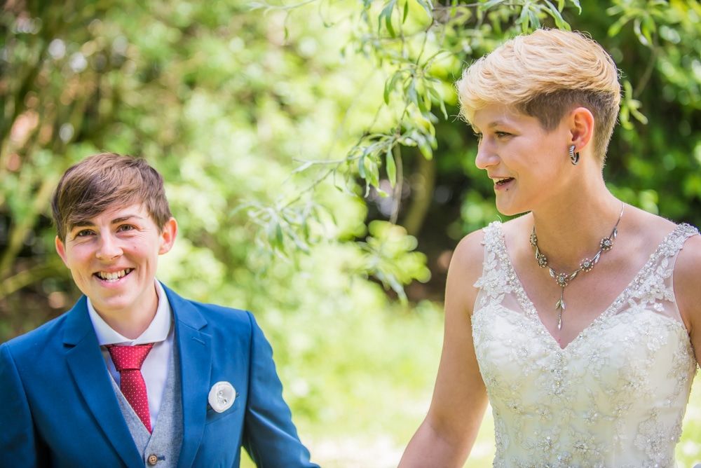 Laughing together, Carlisle Register office, Lake District wedding photography