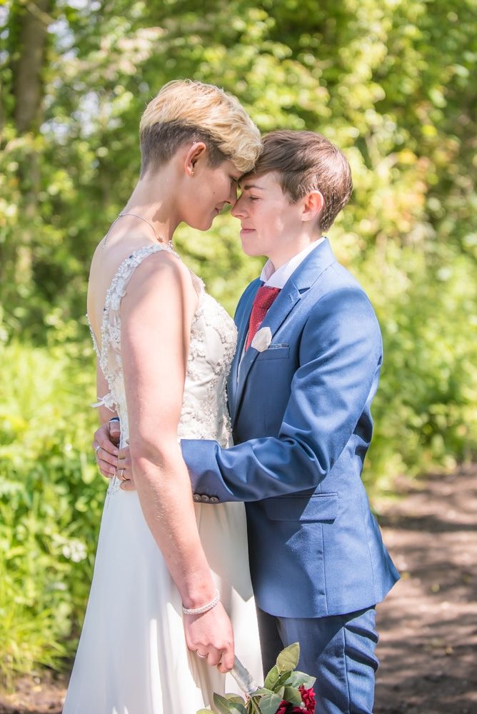 Posing in the countryside, Carlisle Register office, Lake District wedding photography