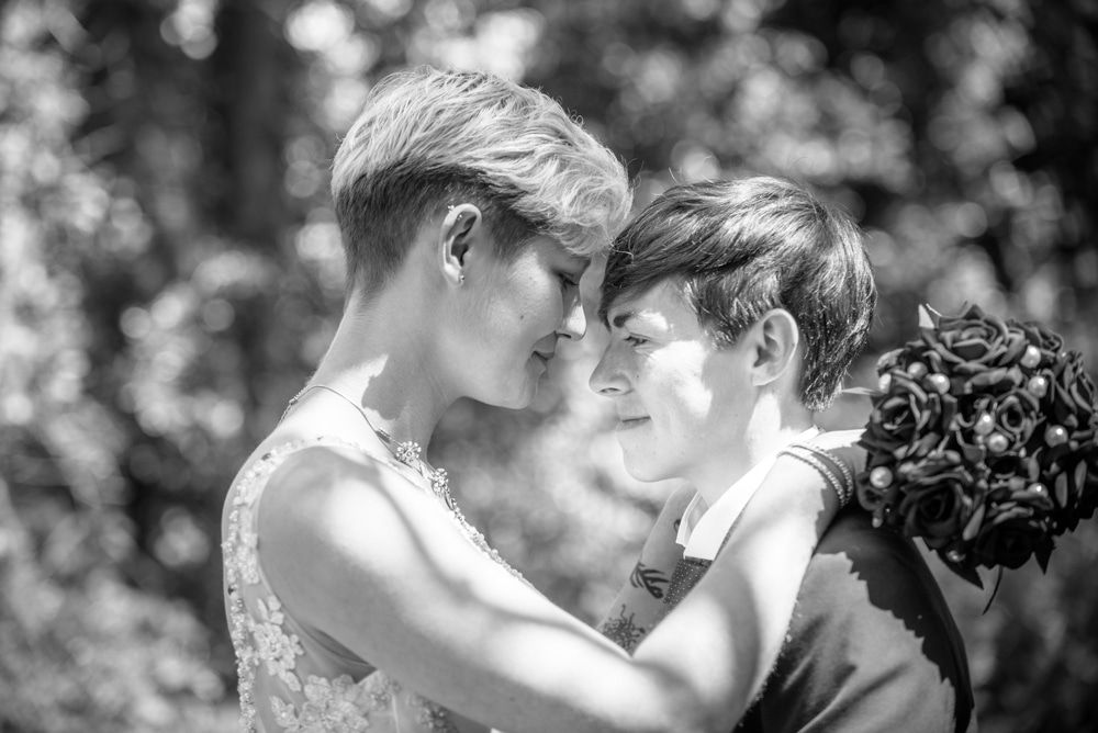 Posing for camera, Carlisle Register office, Lake District wedding photography