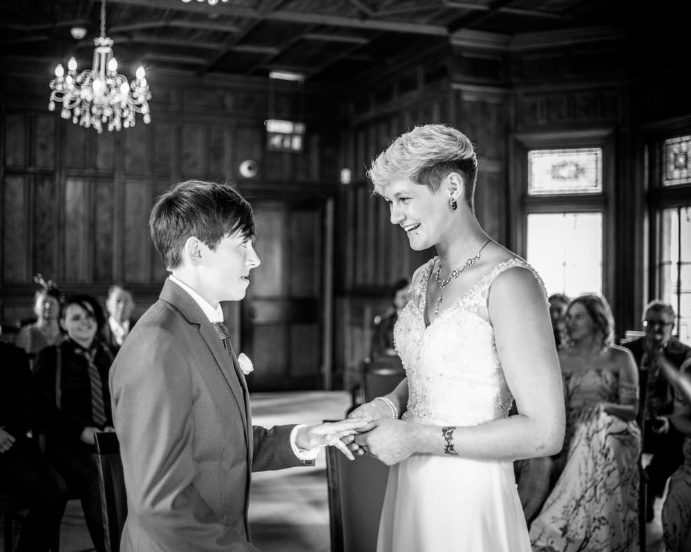 Ring exchange, Carlisle Register office, Lake District wedding photography