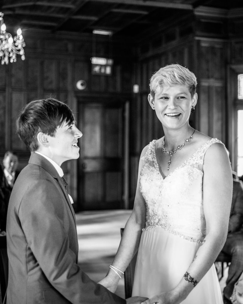 Laughing in ceremony, Carlisle Register office, Lake District wedding photography