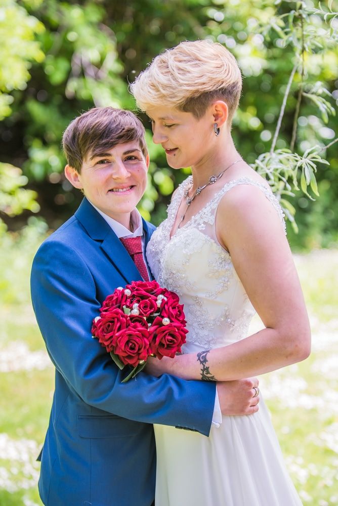 Smiles for photos outside, Carlisle Register office, Lake District wedding photography