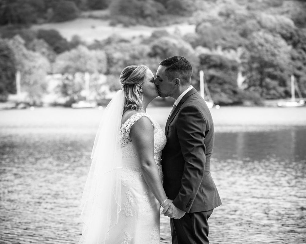 Bride and groom kissing, Lake District weddings