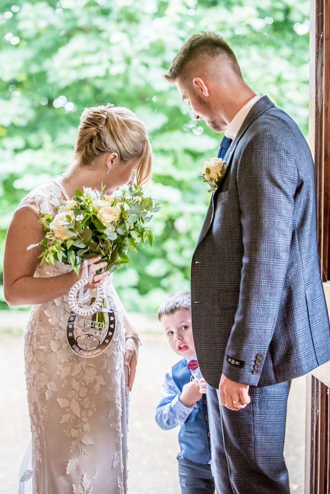 Milo hiding,  wedding photographers Carlisle register office elopement wedding Lake District