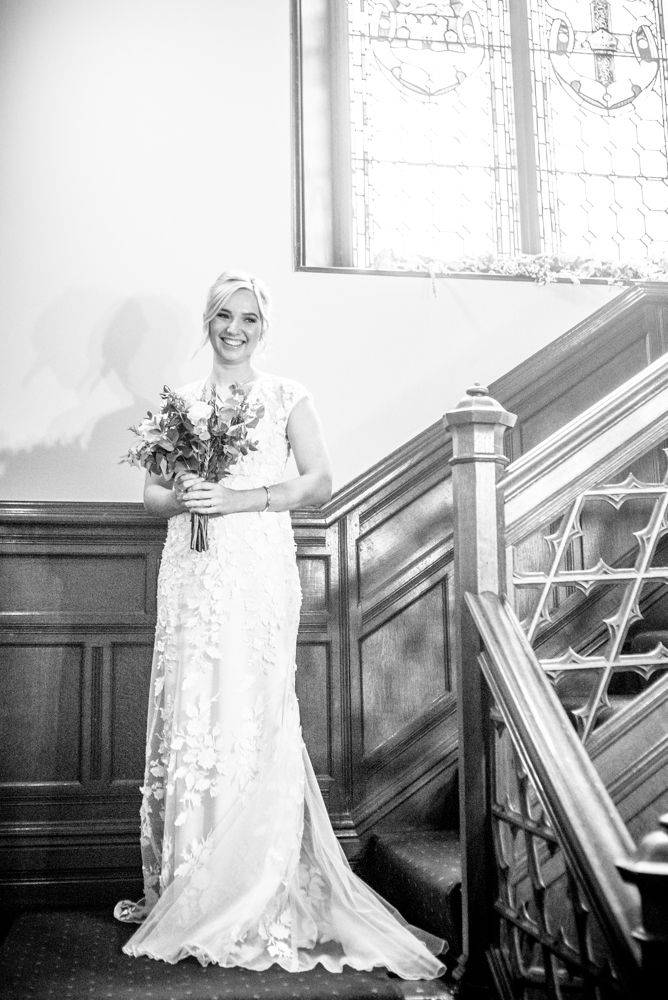 Alex on the staircase,  wedding photographers Carlisle register office elopement wedding Lake District