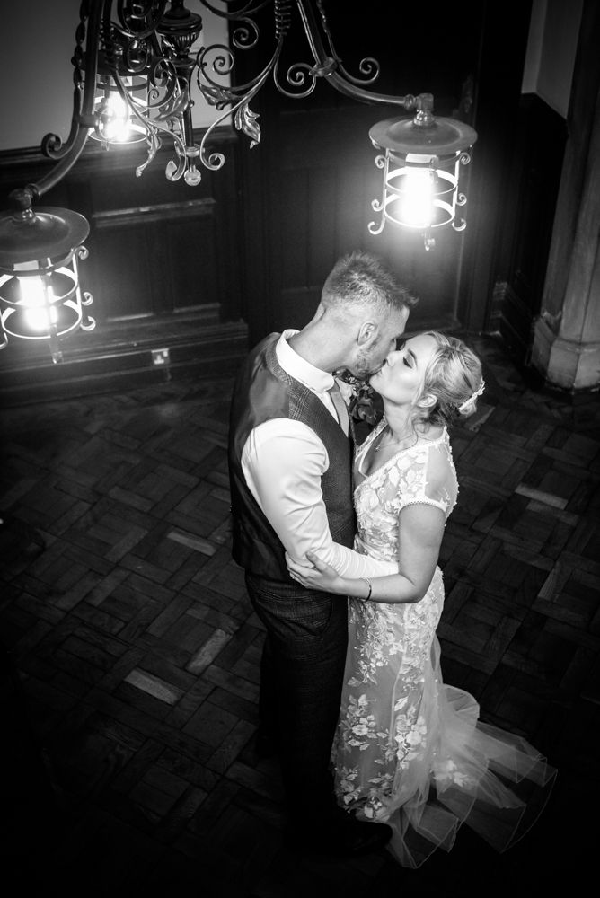 Kisses inside the register office,  wedding photographers Carlisle register office elopement wedding Lake District