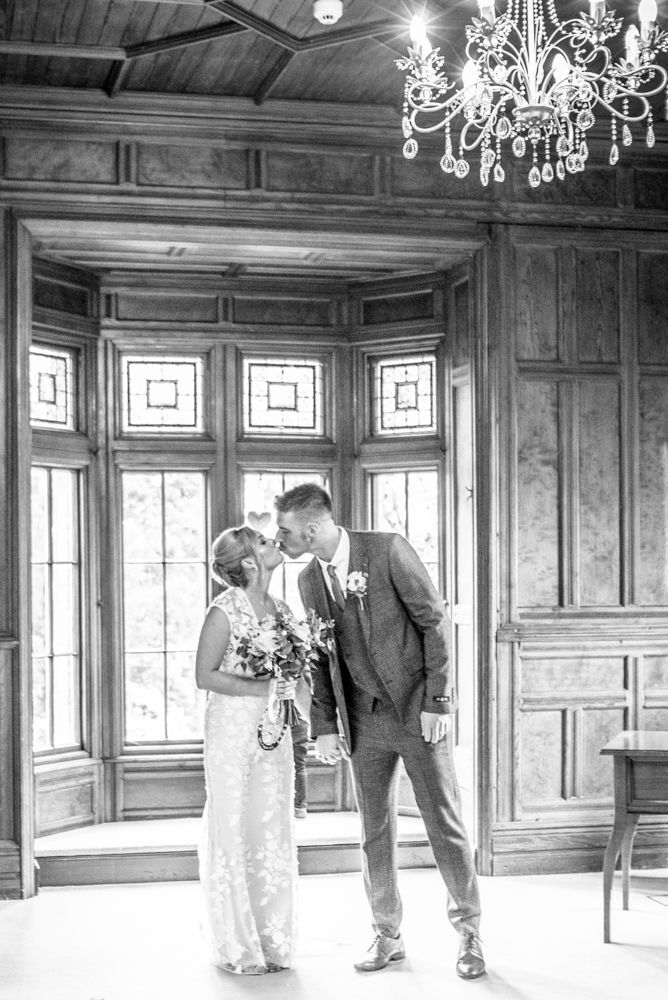 Kisses after wedding ceremony,  wedding photographers Carlisle register office elopement wedding Lake District