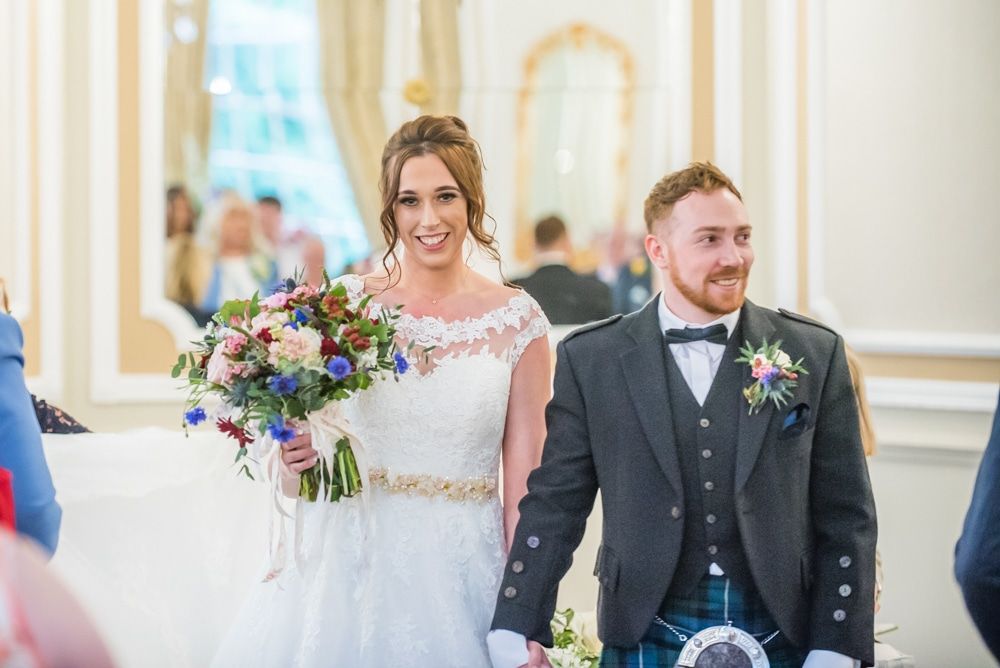 Walking out of ceremony as Mr and Mrs, Sheffield wedding photographers, Ringwood Hall Hotel
