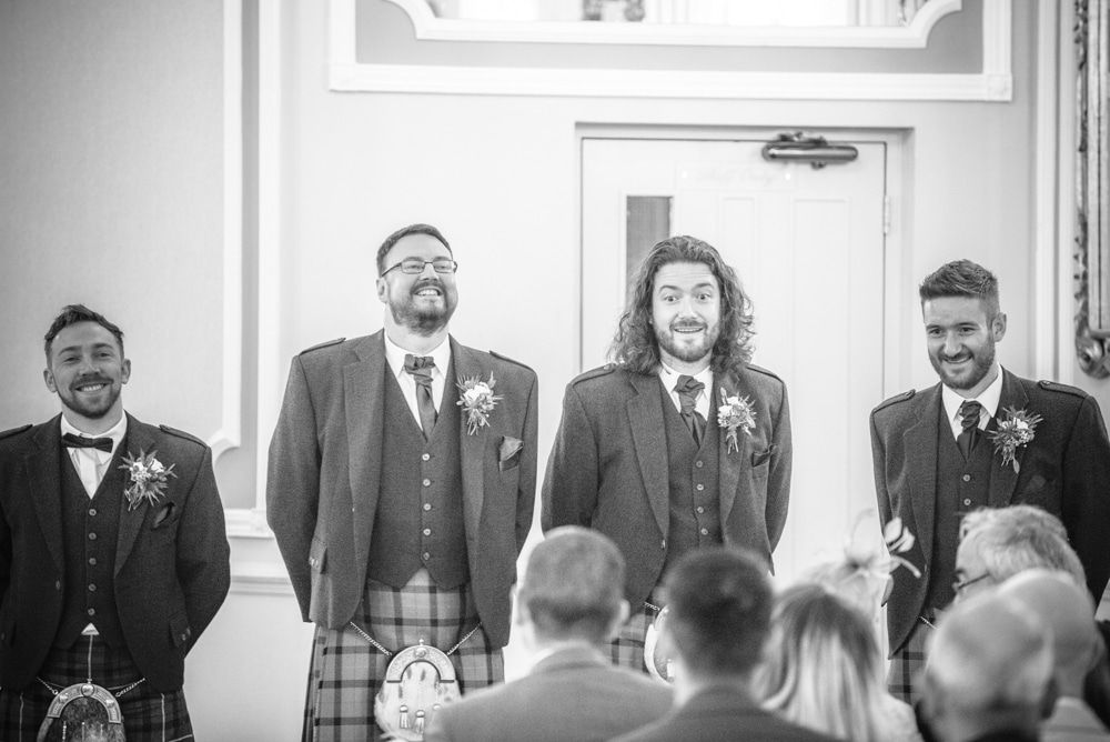 Groomsmen waiting nervously in ceremony, Sheffield wedding photographers, Ringwood Hall Hotel