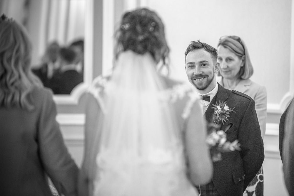 Groom Alastair's first look at bride, Sheffield wedding photographers, Ringwood Hall Hotel