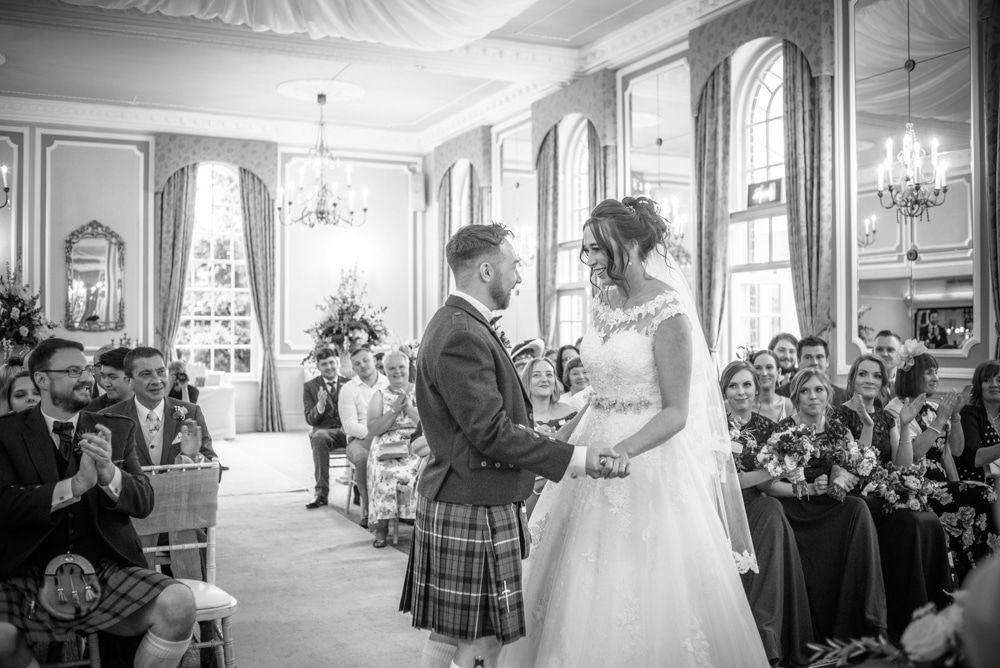 Groom in kilt - that just married laughter, Sheffield wedding photographers, Ringwood Hall Hotel