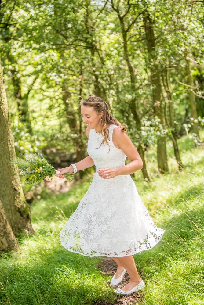 Bec spinning in her dress, Howgills wedding, Sedbergh, Lake District wedding photographers
