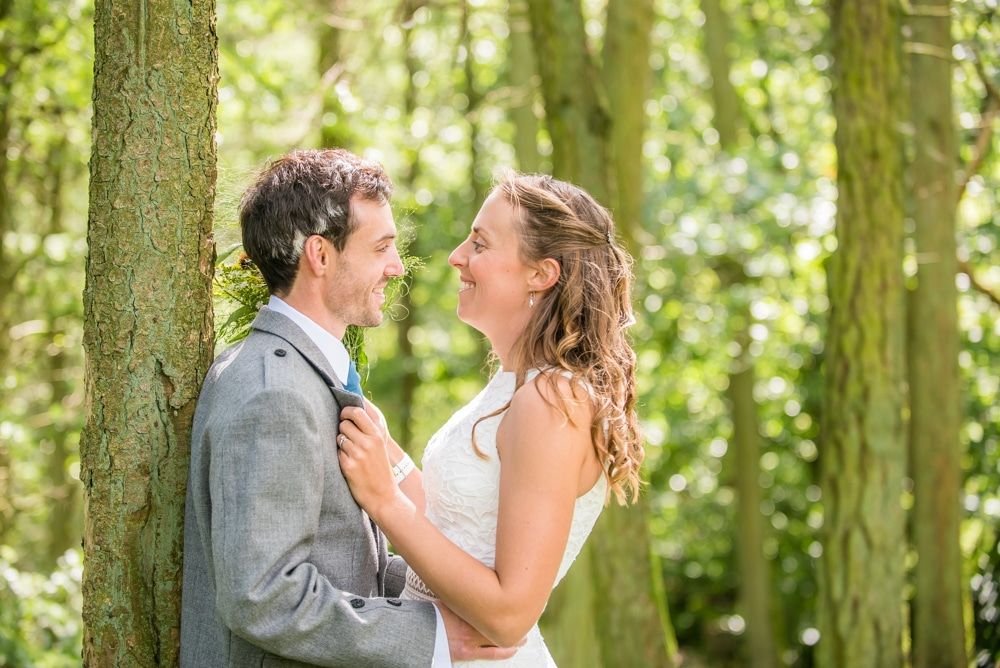 Posing together in the woodland, Howgills wedding, Sedbergh, Lake District wedding photographers