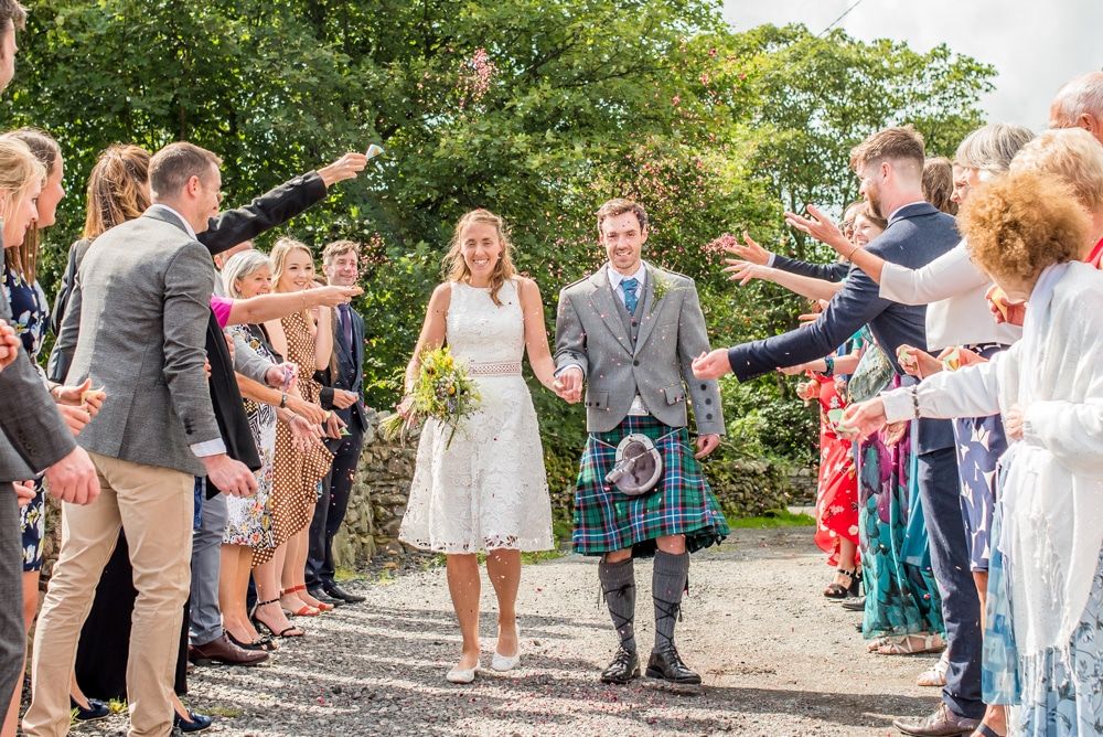 Confetti throwing, Howgills wedding, Sedbergh, Lake District wedding photographers