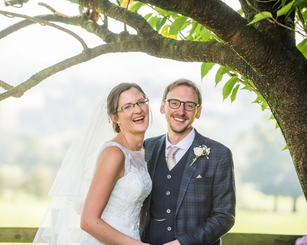 Bride and groom laughing, Shireburn Arms, Lancashire wedding photographers