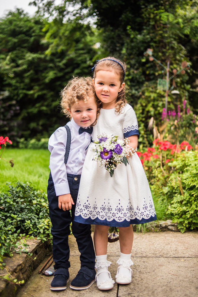 Pageboy and flower girl posing, Shireburn Arms, Lancashire wedding photographers