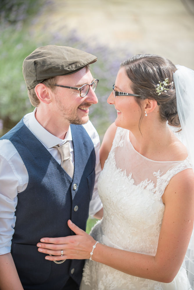 Groom in flat cap, Shireburn Arms, Lancashire wedding photographers